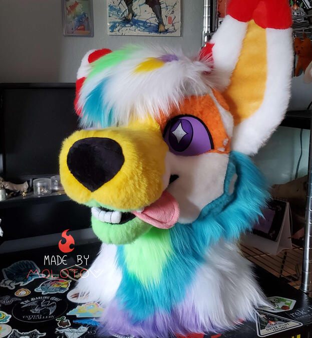 Quartz The fursuit head of Quartz, a colorful australian shepherd.