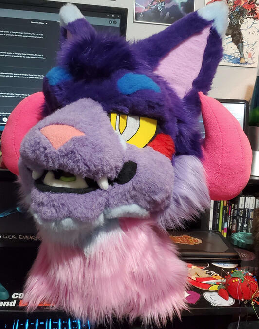 bh2 The head of Bleeding Heart, a brightly colored cat beast with curled pink horns.